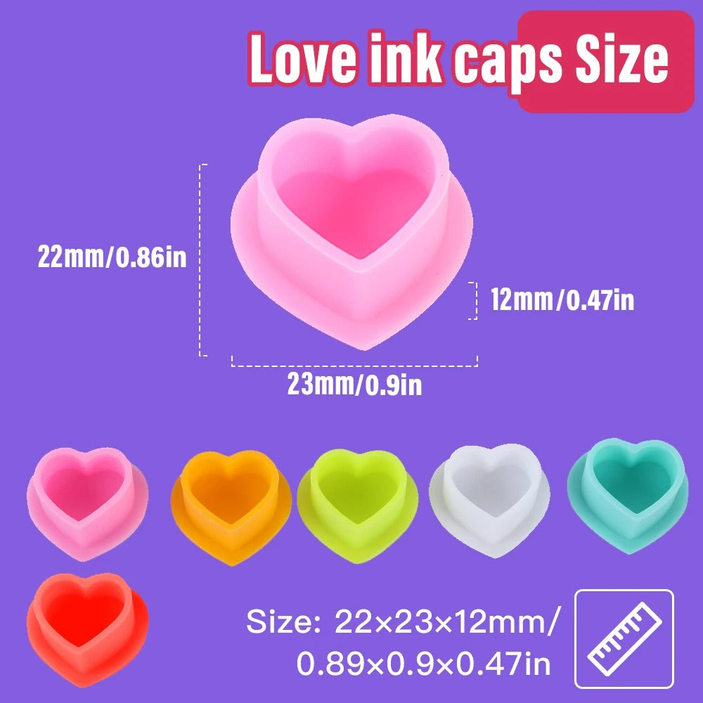 Audersigt 100Pcs Disposable Tattoo Silicone Heart Ink Cup very soft no harm for your machine and your needles