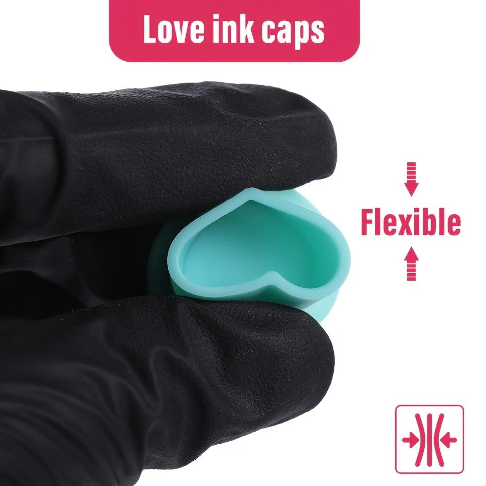 Audersigt 100Pcs Disposable Tattoo Silicone Heart Ink Cup very soft no harm for your machine and your needles